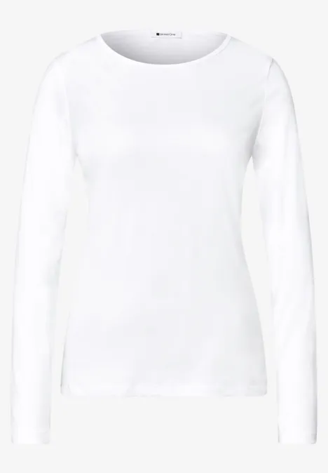 Effen shirt met lange mouwen White Een eenvoudig wit shirt met lange mouwen en ronde hals.