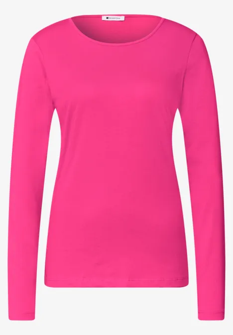 Basic Langarm Shirt in Unifarbe magenta dream Ein schlichtes, langärmliges Oberteil in kräftigem Pink mit Rundhalsausschnitt.