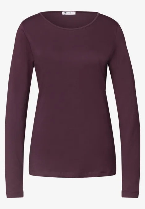T-shirt basique à manches longues, couleur unie rustic rouge T-shirt femme manches longues bordeaux à col rond sur fond blanc.