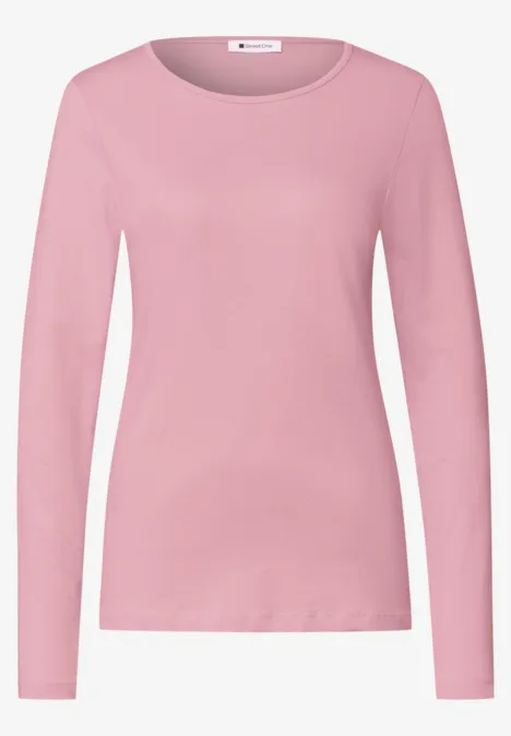 Rosa Langarmshirt mit Rundhalsausschnitt, schlicht und enganliegend.