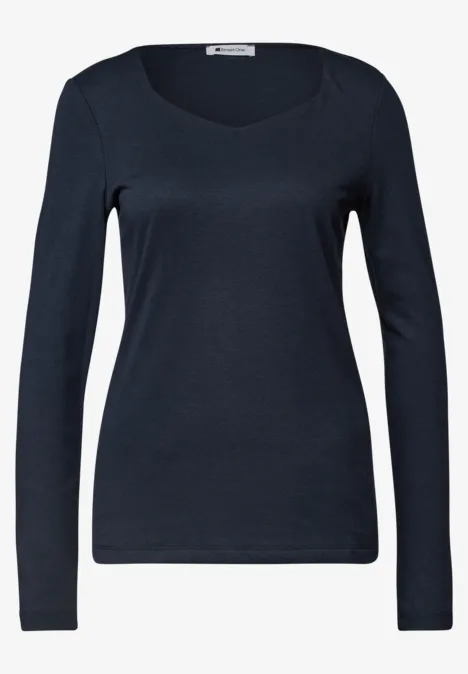 Effen donkerblauw damesshirt met lange mouwen en ronde hals.