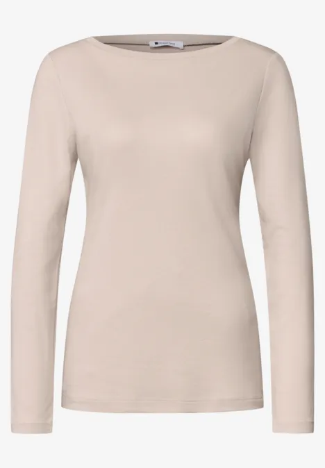Schlichtes beiges Langarmshirt mit Rundhalsausschnitt, eng anliegender Passform.