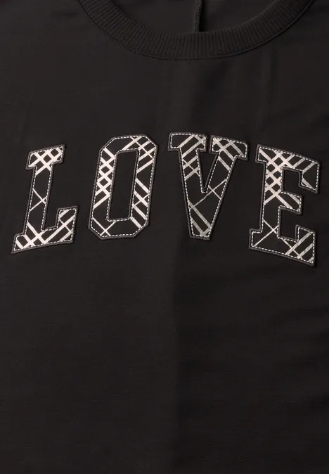Langarm Shirt mit Wording Artwork black coffee Schwarzes T-Shirt mit dem Aufdruck 'LOVE' in weißer, grafischer Buchstabenoptik.