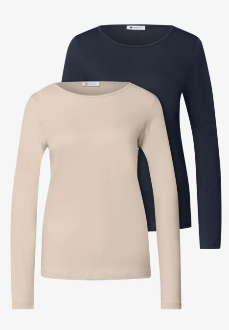 Twee elegante lange mouw T-shirts in beige en donkerblauw.