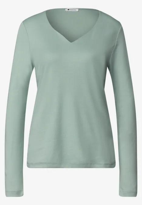 Lichtgroen dameslangarmshirt met V-hals