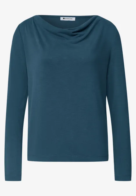 Dames shirt met lange mouwen in blauwgroen en watervalhals