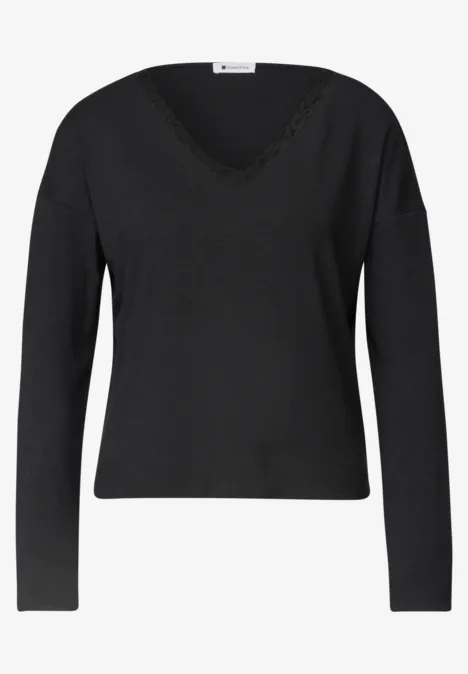 T-shirt à manches longues, col en V et détail en dentelle Black Schwarzer, langärmliger Damenpullover mit V-Ausschnitt und feinem Rippstrick am Saum.
