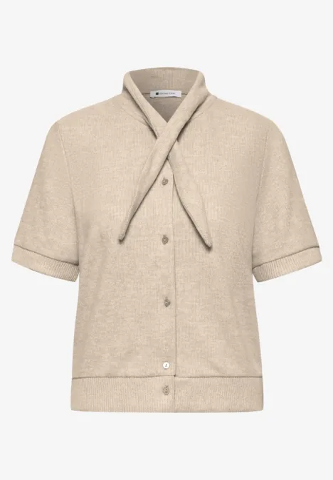 Beige Kurzarmjacke aus Frottee mit Knopfleiste und modischem Kragenband.