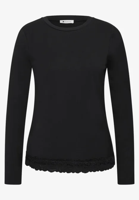 Langarm Shirt mit Rundhals und Spitzenkante Black Schwarzes Langarmshirt mit zartem Spitzenbesatz am Saum.