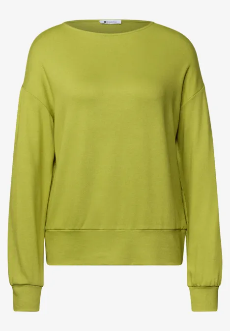 T-shirt en maille à manches chauve-souris apple lime Ein schlichtes, langärmeliges Sweatshirt in leuchtendem Grün mit Rundhalsausschnitt.