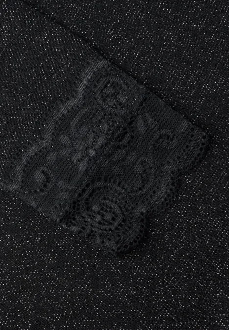T-shirt à manches longues avec paillettes et dentelle Black Gros plan sur un tissu noir à points scintillants et bordure en dentelle.