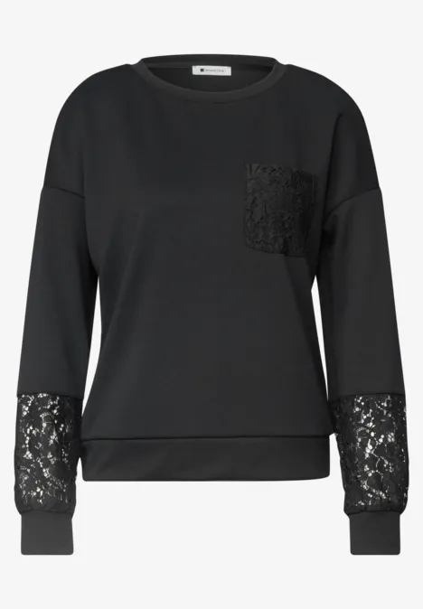 Schwarzer Pullover mit Rundhalsausschnitt, Spitze an Tasche und Ärmeln