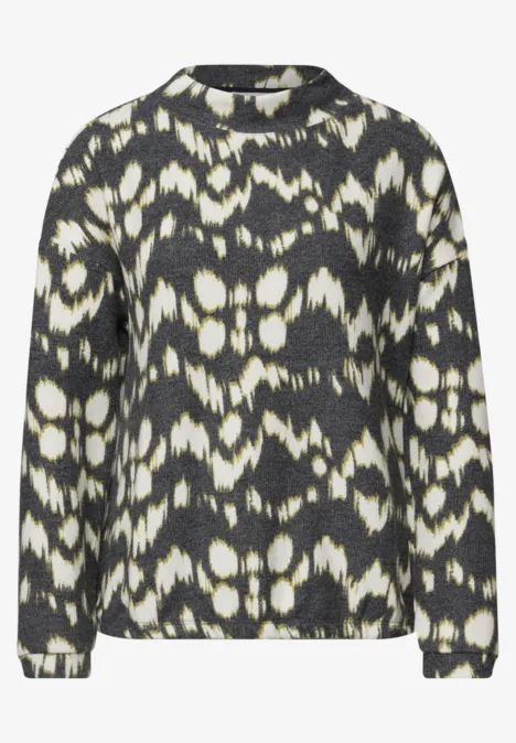 T-shirt à manches longues, col roulé et imprimé Black Schwarzer und weißer Pullover mit abstraktem Batik-/Ikat-Muster, Rundhalsausschnitt und langen Ärmeln.