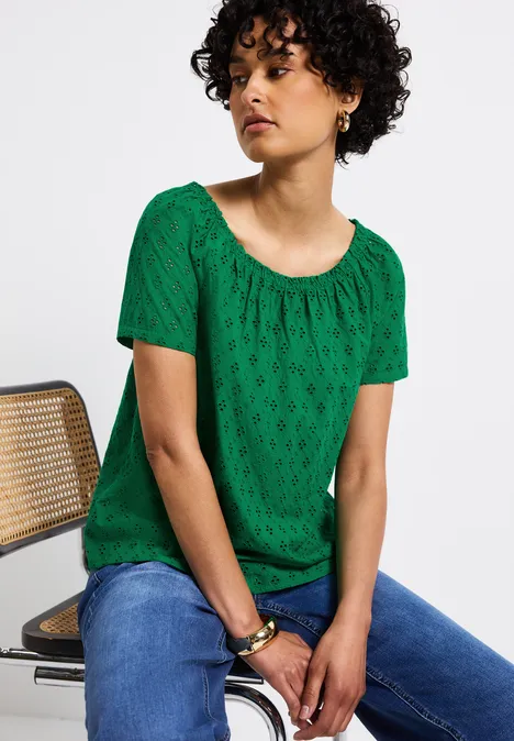Bluse mit Lochstickerei glowing green