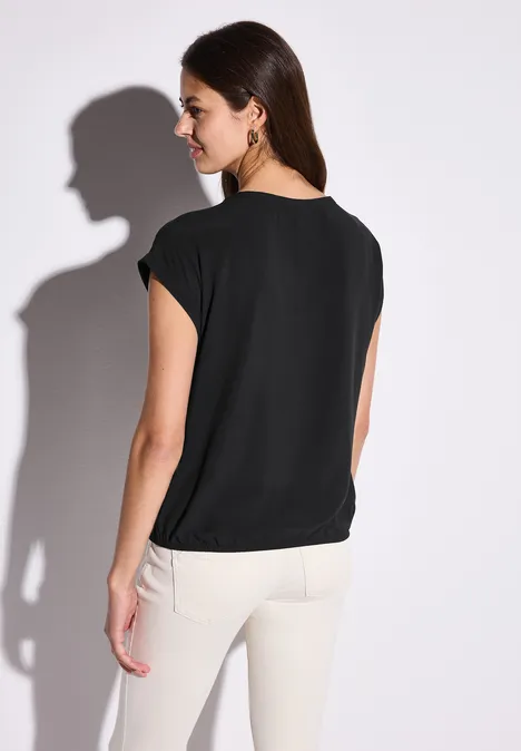 Bluse mit elastischem Saum Black
