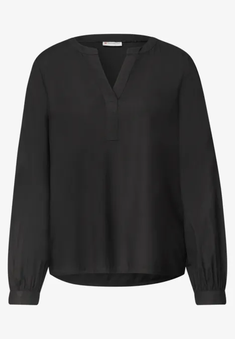 Split Neck Tunika Black Schlichte schwarze Bluse mit V-Ausschnitt und langen Ärmeln.