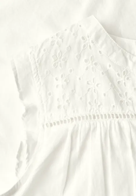 Blousetop met gespleten hals en shiffley-details off white