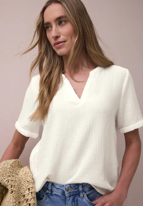 Blouse met korte mouwen in mousseline kwaliteit off white Blouse met korte mouwen in mousseline kwaliteit off white
