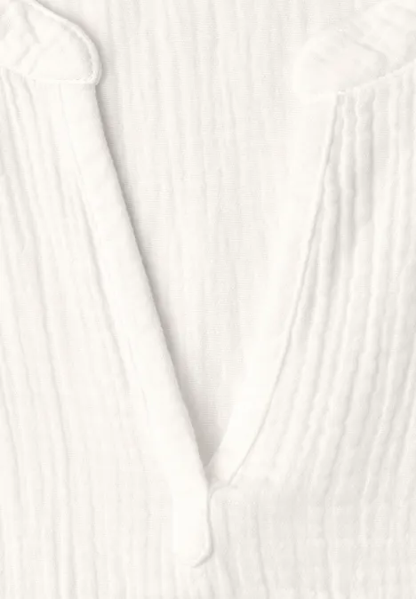 Wit wafelgebreid bovenstuk met V-hals
