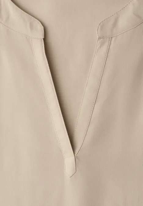 Blouse met losse schouders en gespleten hals cotton beige