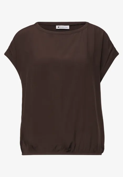 Bruin dames-T-shirt, losse pasvorm, boothals en korte mouwen.