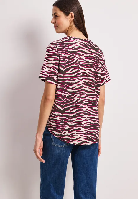 Blouse à manches courtes avec split neck et imprimé minimal rose