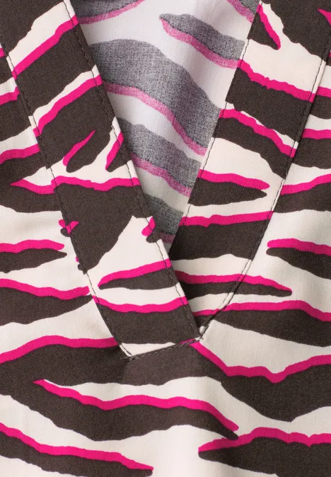 Blouse à manches courtes avec split neck et imprimé minimal rose