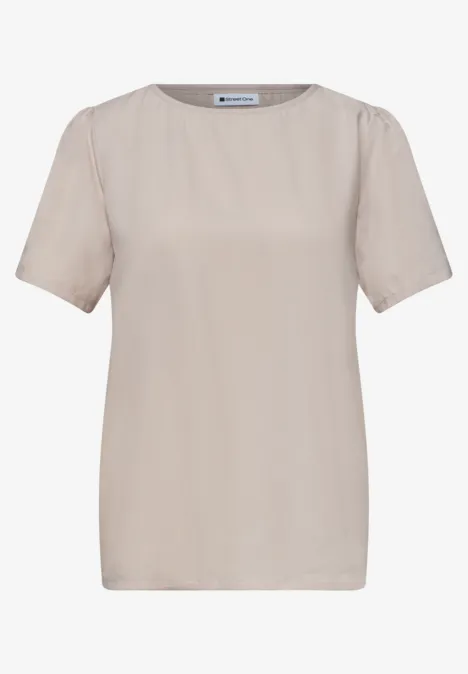 Blouse met ronde hals en korte pofmouwen cotton beige Effen crème T-shirt met korte mouwen, ronde hals en een losse pasvorm.