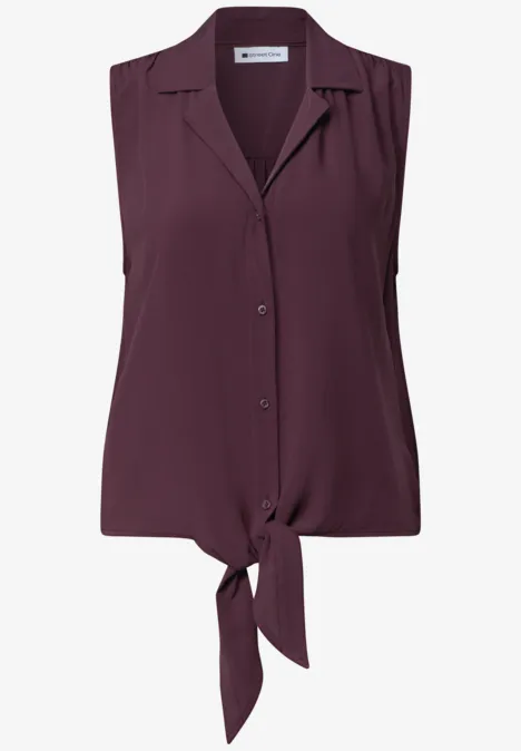 Blusentop mit Bowling-Kragen und Knoten rustic rouge Ärmellose Bluse in Pflaumenfarbe mit Knopfleiste und frontaler Knoten-Optik.