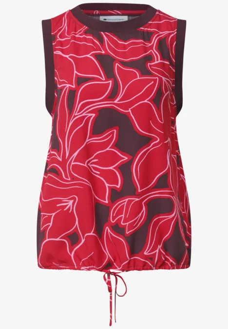 Rotes ärmelloses Oberteil mit großem floralen Muster und Kordelzug am Saum.