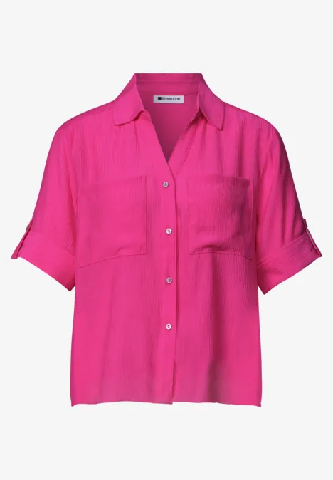 Overhemd met korte mouwen en omgeslagen manchetten magenta dream Licht fuchsiablouse met korte mouwen, knoopsluiting en borstzakken.