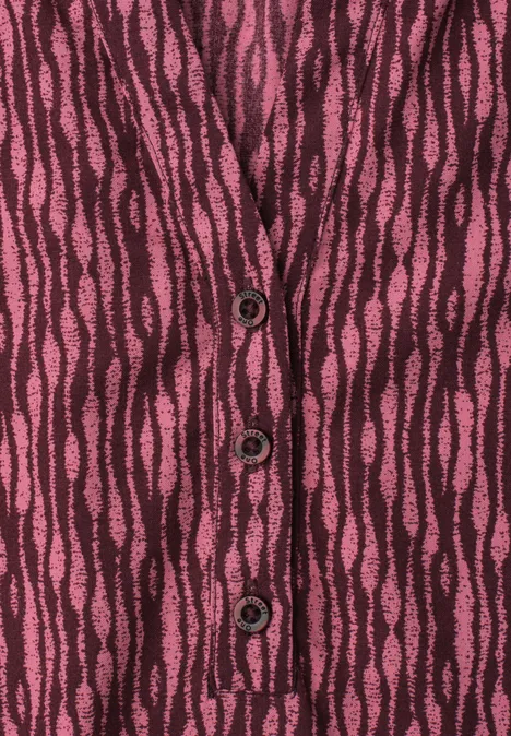 Blouse met korte mouwen, gespleten hals en elastische zoom blush berry Mouwloos gebreid topje met V-hals en knopen, roze-bruin golvend patroon.