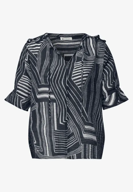 Blouse met korte mouwen, split in de hals en print darkest blue Zwart-witte damesblouse met V-hals, korte mouwen en abstract geometrisch patroon.