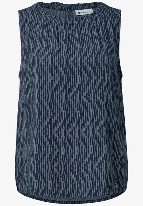 Débardeur sans manches bleu foncé à motif graphique en zigzag et encolure ronde.