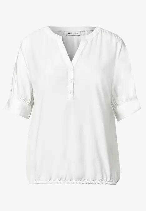 Blouse met korte mouwen, split in de hals en elastische zoom off white Weiße Bluse mit V-Ausschnitt, kurzer Knopfleiste und elastischem Saum.
