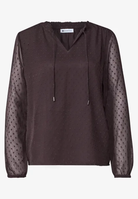 Dunkelbraune Bluse mit transparenten, gepunkteten Ärmeln und V-Ausschnitt mit Kordelzug.