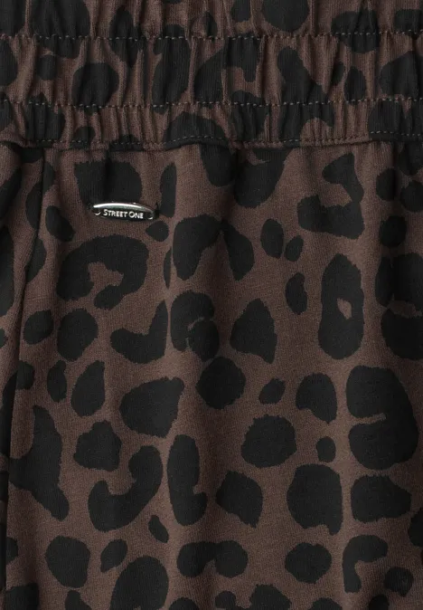Knielanger Rock mit Elastikbund molten earth Dunkelbraune Hose mit elastischem Bund und schwarzem Leopardenmuster.