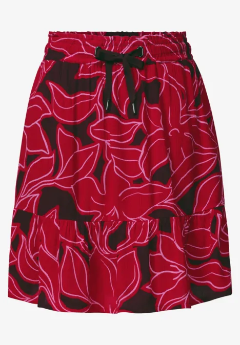 Knielanger Rock mit Print und Volant salsa red Roter Rock mit elastischem Bund, schwarzer Schleife an der Taille und abstraktem Blumenmuster.