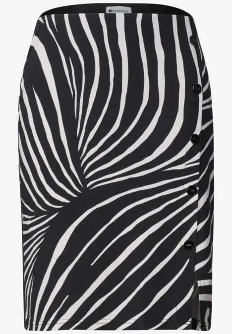 Noire jupe crayon à motif zèbre blanc.