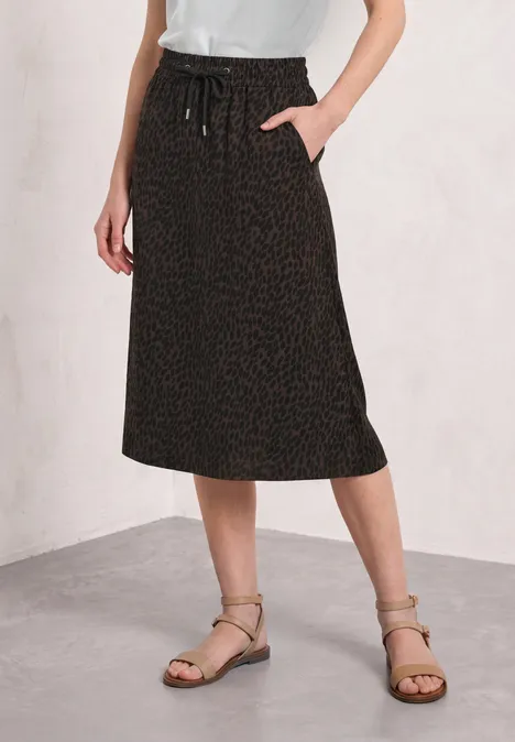 Jupe midi noire décontractée avec cordon de taille et poches latérales.