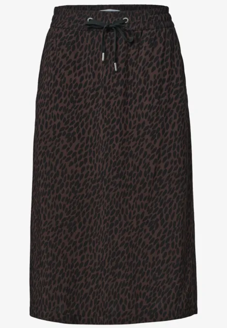 Jupe midi marron à imprimé léopard noir, taille élastique avec cordon.