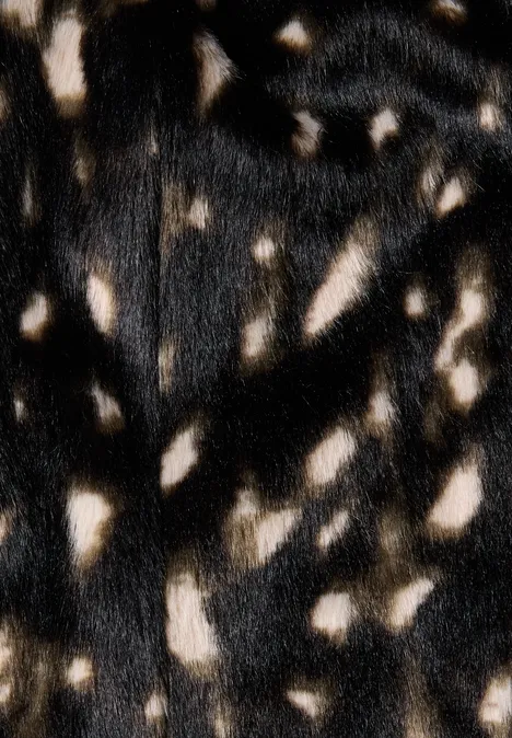Knielanger Fake-Fur Rock mit Muster Black Schwarz-braunes Fell mit unregelmäßigen cremefarbenen Flecken.