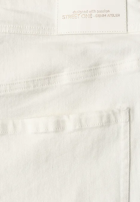 Jeans met flared pijpen en decoratieve zoom Ecru Washed