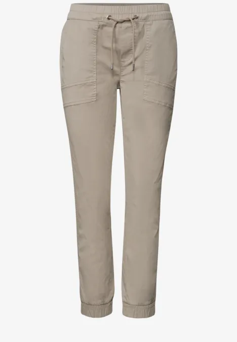 Beige cargobroek voor dames met aantrekkoord, zakken en elastische enkels