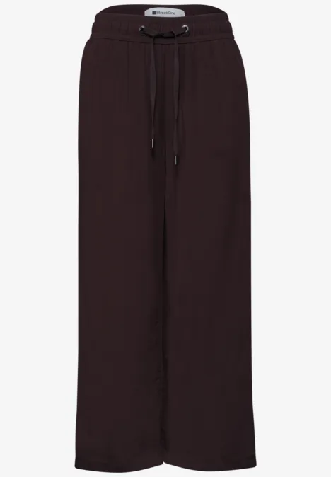 Donkerbruine, wijdvallende broek met elastische taille en trekkoorden, nonchalant en lang model.