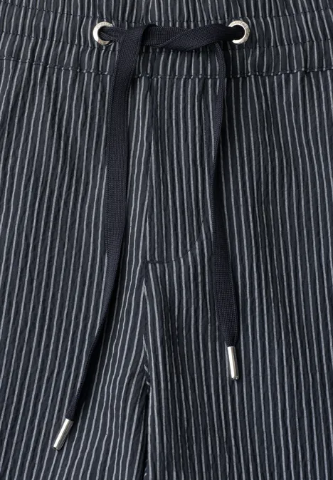 Blauwe gestreepte broek met trekkoord en metalen oogjes