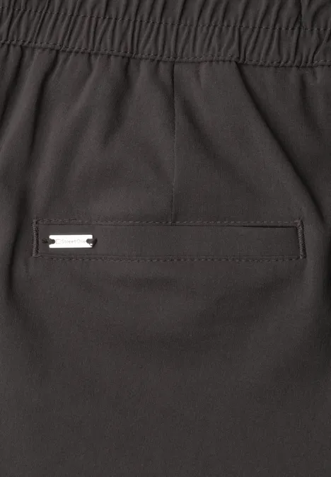 Slim Leg Chino mit Elastikbund deep earth Dunkle Hose mit elastischem Bündchen und Reißverschluss-Tasche am Rücken