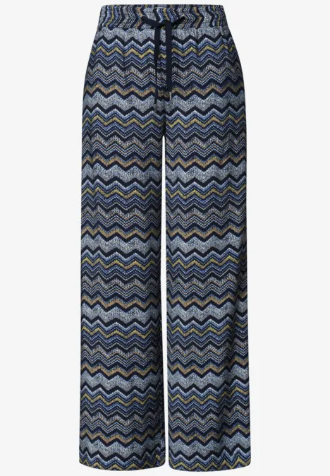 High Waist Wide Leg Hose im Loose Fit frozen wave Weite, locker sitzende Hose mit blau-grauem Zickzackmuster und elastischem Bund sowie Kordelzug.