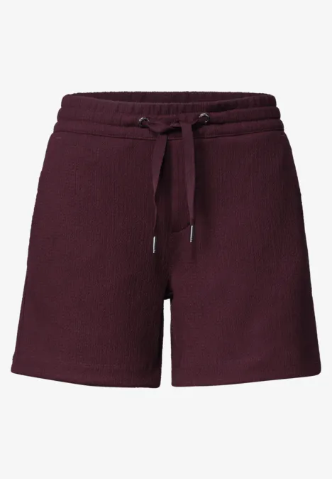 Korte broek met structuur in Loose Fit rustic rouge Donkerrode gebreide damesshorts met elastische taille en aantrekkoord.