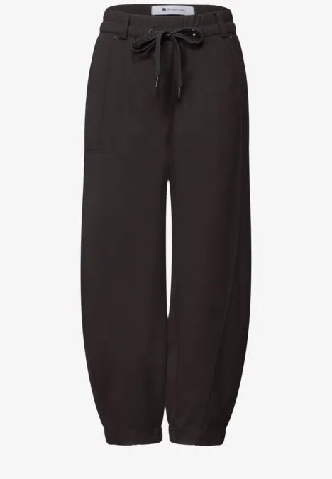 Pantalon de jogging noir à cordon de serrage à la taille et bas élastiques, confortable et décontracté.
